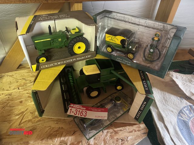 Lot 1-3163 - (1) John Deere Titan Combine, John Deere 3010, and John Deere gas pumps