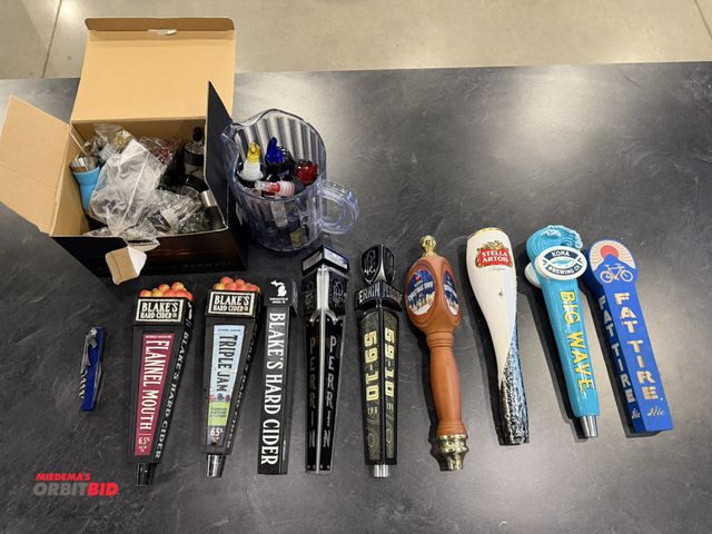 Lot 1-11154 - (9) Assorted brand tap handles with assorted bar accessories, including new and used liquior bottle ...