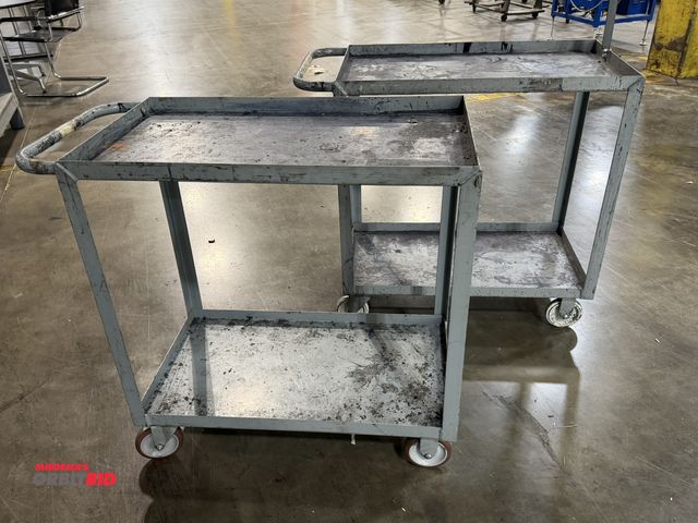 Lot 1-5405 - Lot of (2) 32" length x 35" height x 18" depth, 2-tier steel shop carts.