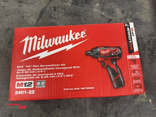 Lot 1-16157 - (1) new Milwaukee, Cat # 2401-22, 1/4" hex screwdriver kit (12V cordless, rechargeable red lithium),...