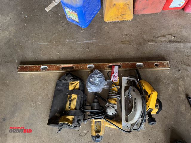 Lot 1-19915 - (1) DeWalt 7 1/4" circular saw, model DW364, (1) DeWalt 4.5" angle grinder, (1) DeWalt 1/2" impact w...