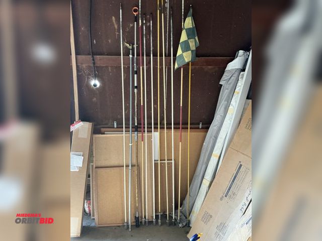 Lot 1-18250 - (9) Flag sticks, (1) flag pole with American Eagle top, and (1) ball retriever