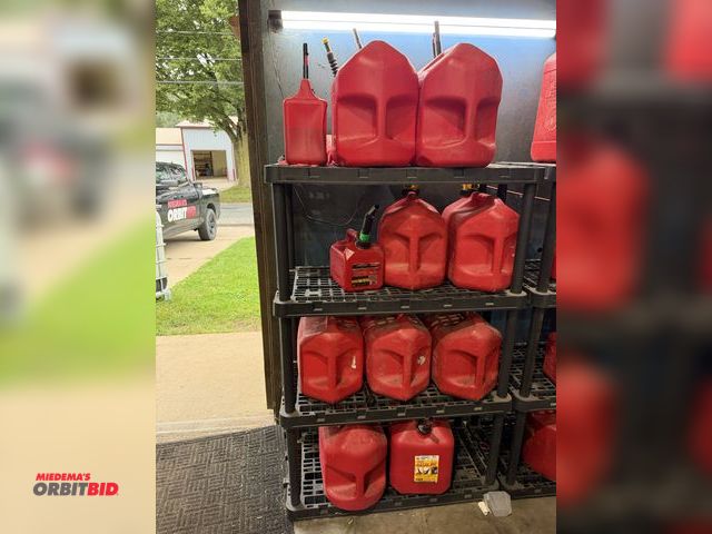 Lot 1-18651 - Lot including rack, 36" width x 18" depth x 55" height, and contents of (9) 5-gallon gas cans, and (...