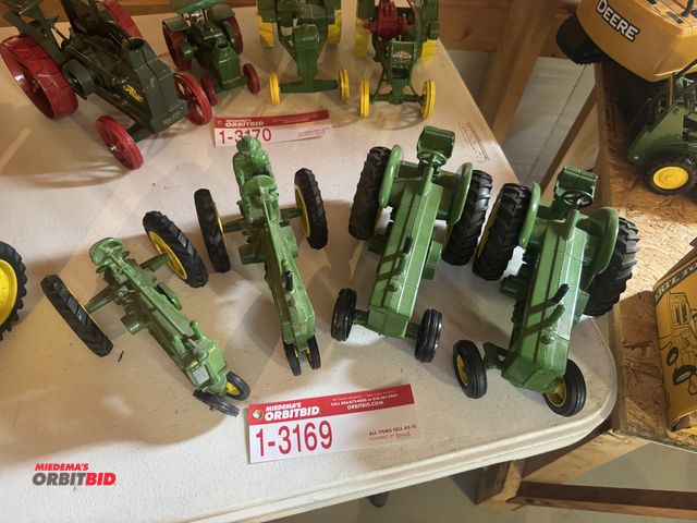Lot 1-3169 - (4) John Deere Die Cast Tractors, model 80 diesel, model R diesel, model A and (1) unknown