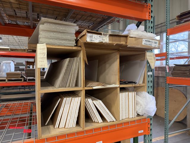 Lot 1-17361 - Entire content only of racking shown in photo, includes various cardboard inserts, reinforcement cor...
