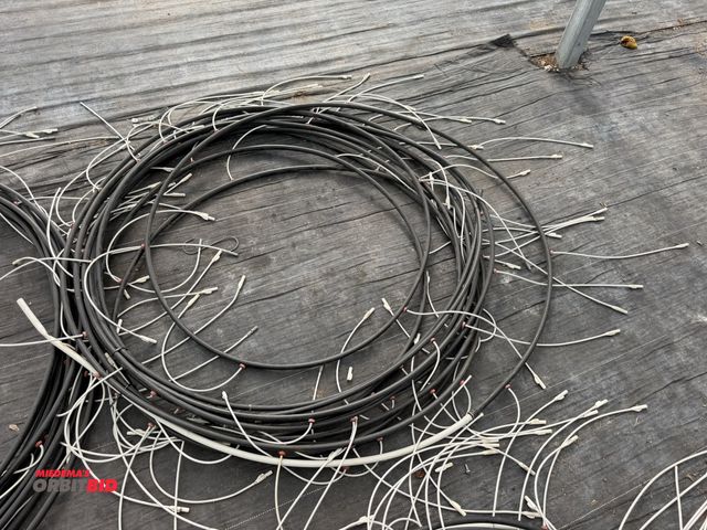 Lot 1-9932 - (1) Netafim 120' long piece of irrigation pipe with 20" on center drops.