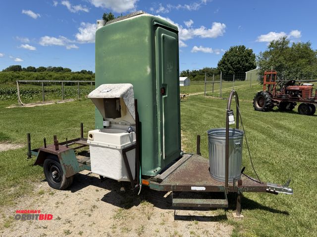 Lot 1-102585 - (1) Portable restroom with hand washing station, off road use only. Please note: Unit is not require...