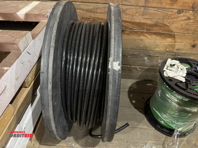 Lot 1-4412 - (1) partial plastic spool of South Wire Simpull 2/0 AWG copper wiring, 24" diameter x 8 3/4".