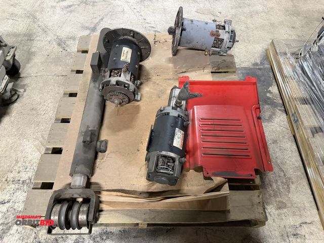 Lot 1-17544 - Lot of motors, hydraulic shafts, and (1) panel for a Raymond forklift (model unknown), working condi...