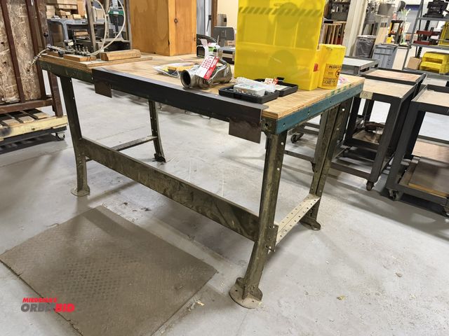 Lot 1-18968 - (1) steel frame metal shop table, 60" x 34", wood top, table only, does not include contents.