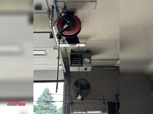 Lot 1-587 - (1) Sabre approx. 50' long retractable extension cord, and (1) Tekton approx. 50' retractable air ho...