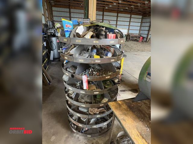 Lot 1-19929 - (1) carousel style parts bin, approx. 36" diameter x 65" tall, 8 tier, includes contents of assorted...