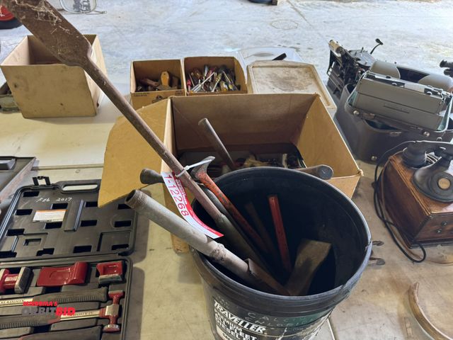 Lot 1-12268 - Lot of assorted heavy duty pry bars, chisels, hammers, files, and lag bolts.