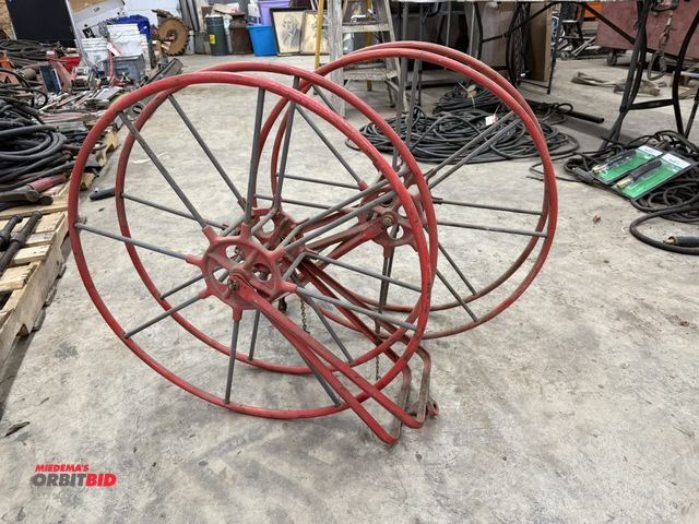 Lot 1-1379 - Set of (2) approx. 27" diameter hose reels (approx. 4.5" interior width x 10" depth to core), no oth...