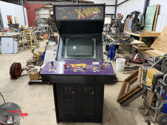 Lot 1-1489 - (1) Konami, model 065251, Xmen arcade game, powered on, appears to need minor repairs on coin operat...