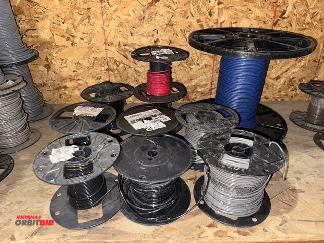 Lot 1-4521 - Lot of (10) partial spools of 12 gauge wired, blue, red, black, and gray.