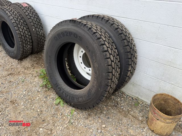 Lot 1-18250 - Lot of (2) new Gladiator 11R24.5 tires, model QR92P0S.