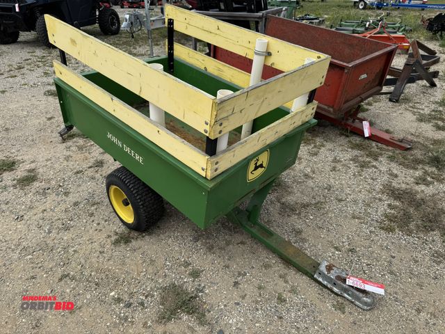 Lot 1-6693 - (1) John Deere lawn cart, 48" x 33", dumps with 2" hitch, removable tailgate.