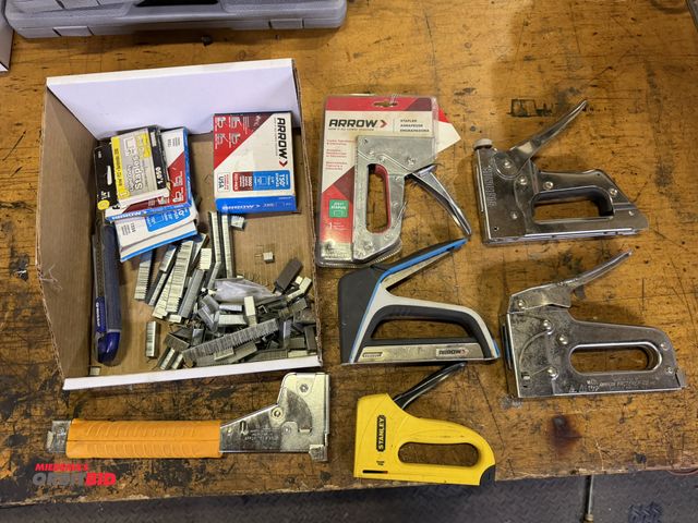 Lot 1-18520 - Large lot of assorted staples with (5) staplers, and (1) slap stapler.