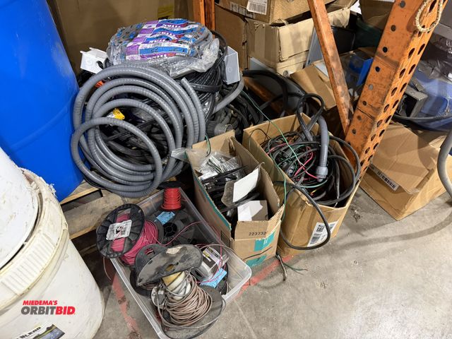 Lot 1-18655 - Large lot of assorted electrical wire, 600V submersible pump cable with cord ends, Titan 1/2" flexib...