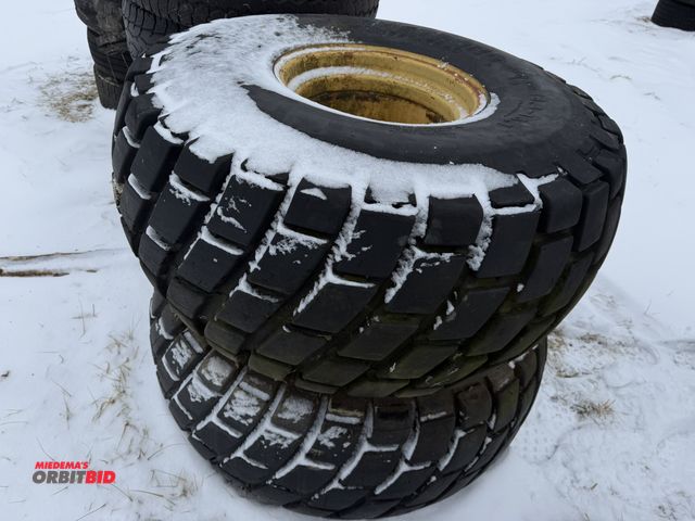 Lot 1-11645 - (1) set of Armstrong 18.4-16.1 turf tires mounted on 8-bolt rims.