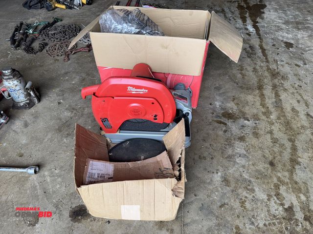 Lot 1-19917 - (1) Milwaukee 14" abrasive cut off machine, unit is new, and (10) new blades.
