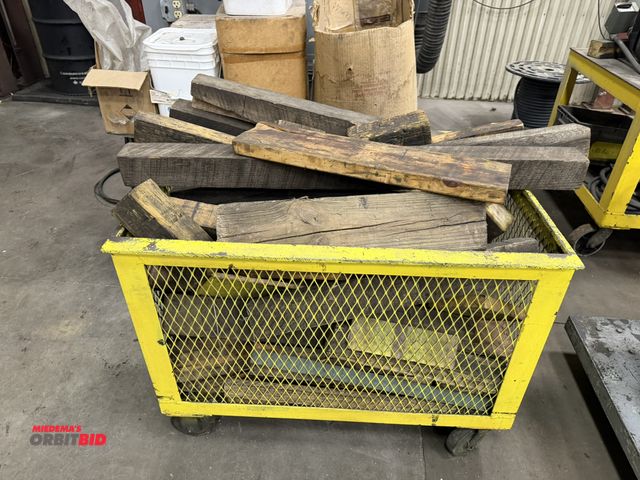 Lot 1-15387 - (1) rolling steel shop cart/basket, 36" x 27" x 29" tall filled with assorted wood dunnage.