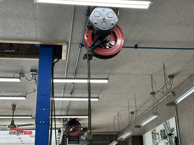 Lot 1-588 - (1) Sabre approx. 50' long retractable extension cord, and (1) Tekton approx. 50' retractable air ho...