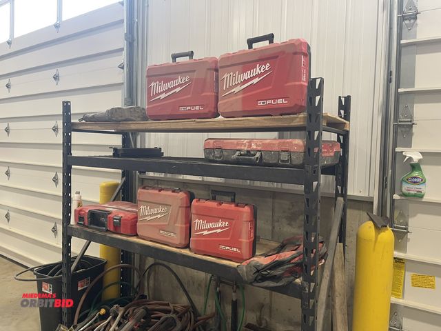 Lot 1-18854 - (1) heavy duty adjustable rack, 77" x 24" x 78" tall, includes assorted Milwaukee and Hilti tool box...