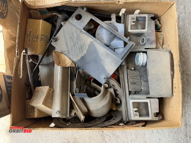 Lot 1-8561 - Large lot of vintage car parts, includes ash trays, trim pieces, clutch gears, 1970 Firebird panels,...