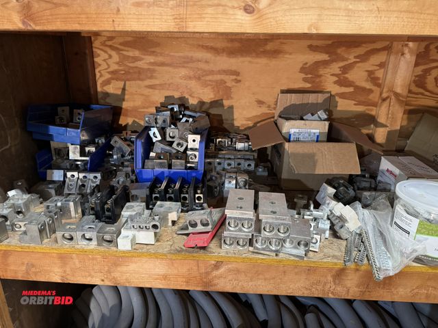 Lot 1-4289 - Large lot of assorted aluminum lugs (various styles), ground bars, and much more, winning bidder res...