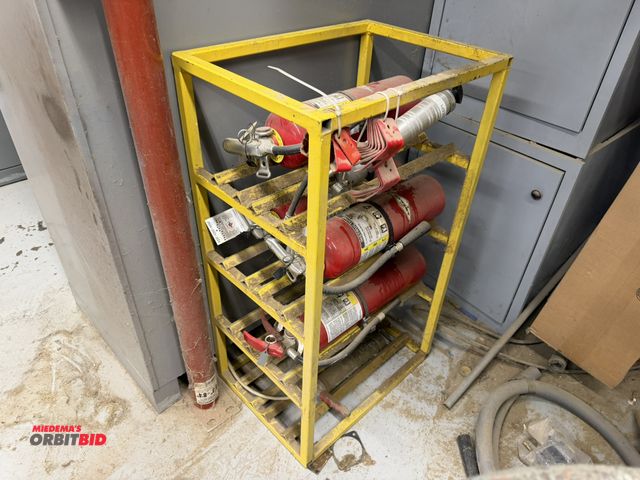 Lot 1-16819 - (1) 8-place fire extinguisher metal stand, 16" wide x 22" long x 38" tall, includes (4) fire extingu...