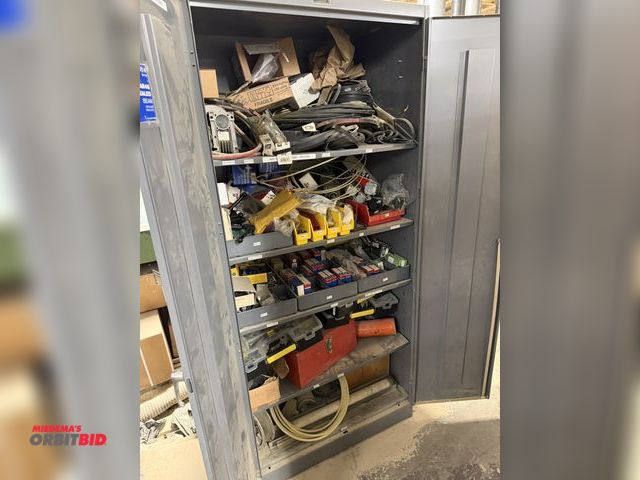 Lot 1-16521 - (1) Tennsco 2-door cabinet with assorted cylinders, belts, parts, bearing, handles, motor drives, va...