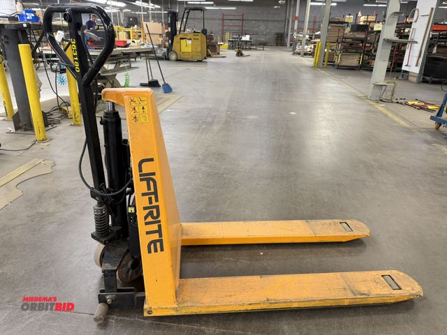 Lot 1-17340 - (1) Lift Rite, 12V electric pallet jack, in working condition, with a Vulcan, model EA12/10L, 10 amp...
