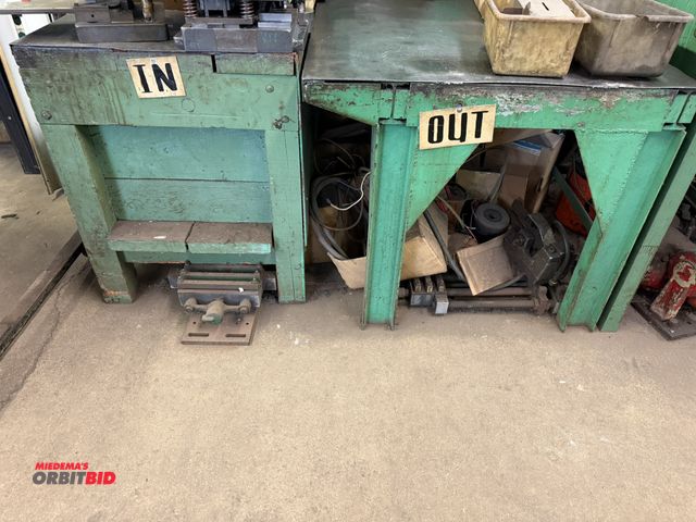 Lot 1-18557 - Lot including (1) 60" width x 32" height x 36" depth heavy duty steel table, and (1) 53" width x 32"...
