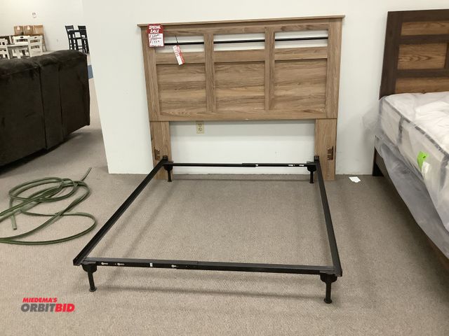 Lot 1-17234 - Full size bed frame and a head board. Headboard is not meant to attach to this frame. Frame measures...