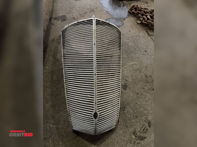 Lot 1-1247 - (1) grill insert for 1937 Ford Coupe, actual vehicle unknown, unit has hole in bottom for crank.