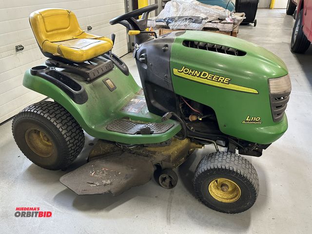Lot 1-19138 - (1) John Deere, model L110, automatic 42" riding lawn mower, Kohler Command 17.5 HP gas engine, hydr...