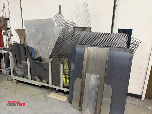 Lot 1-15289 - Large lot of assorted cut metal scrap pieces, includes mostly flat, expanded metal mesh pieces, incl...