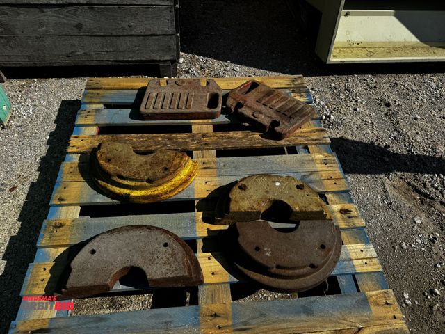 Lot 1-6959 - Lot of (4) believed to be Ford front wheel weights, and (2) front tractor weights.