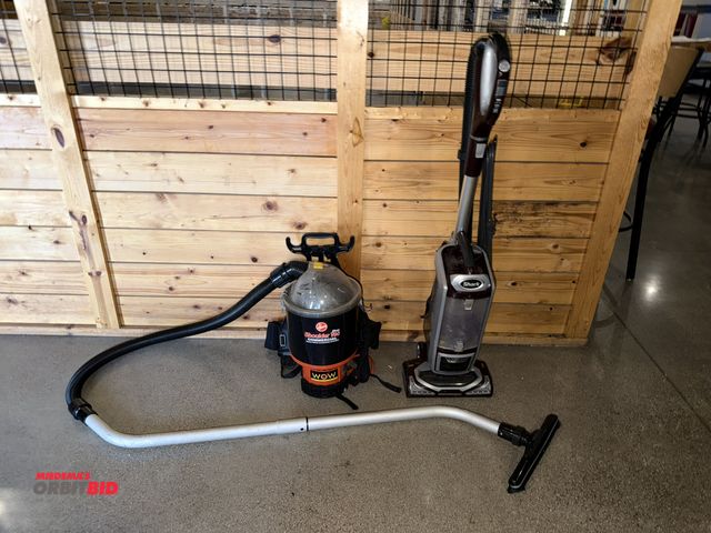 Lot 1-11291 - (1) Hoover Shoulder Vac Pro commercial backpack cleaning system, and (1) Shark rotator vacuum.