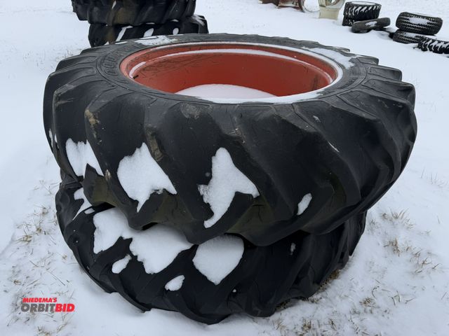 Lot 1-11647 - (1) set of Goodyear 18.4-38 tires on 8-bolt rims, tires are cracked and weather checked.