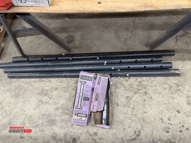 Lot 1-1442 - Lot of (4) 68.5" long adjustable height floor jacks, missing threaded hardware, and (2) new 1' 7" - ...