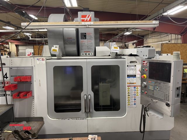 Lot 1-1638 - 2097 Haas VF-4E CNC Vertical Machining Center 30-HP, 10000-RPM, 18" x 52" T-Slot Table, 40-Position ...