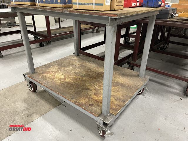 Lot 1-19415 - (1) heavy duty 48" x 48" steel cart with wood top.