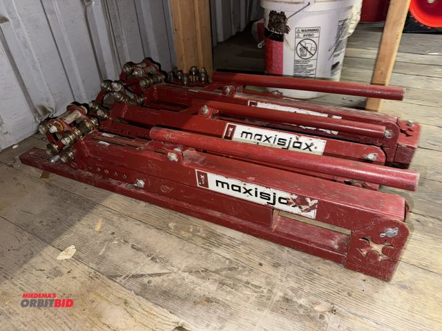 Lot 1-4551 - Lot of (4) Maxis Jax portable reel stands.