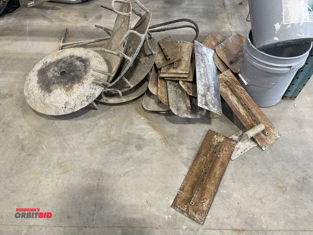Lot 1-18845 - Large lot of assorted concrete fan trowel finishing blades and other related items.
