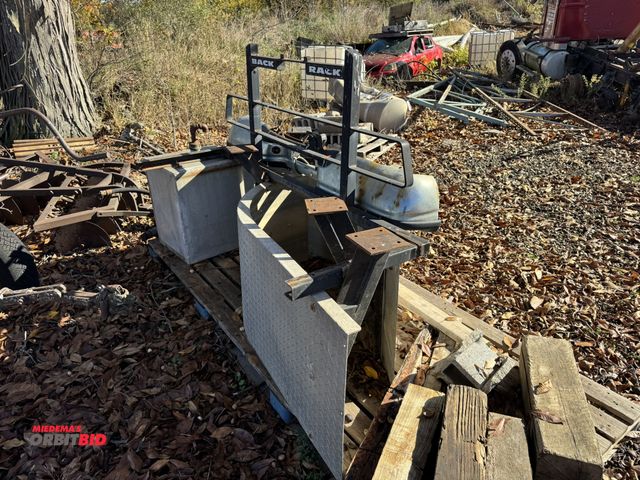 Lot 1-15810 - Lot of assorted items, including (2) aluminum fenders, (1) headache rack, ford bumper, and (1) appro...