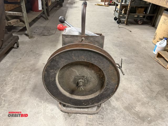 Lot 1-2026 - (1) portable 5/8" steel strapping/banding machine with a Uline tensioner, and crimpers, includes sev...
