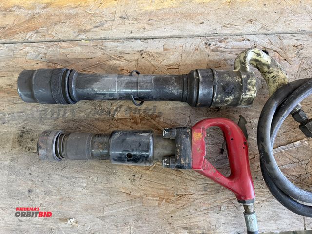 Lot 1-1337 - Lot including (2) make and model unknown air hammers with twist lock attachments, and heavy duty hos...